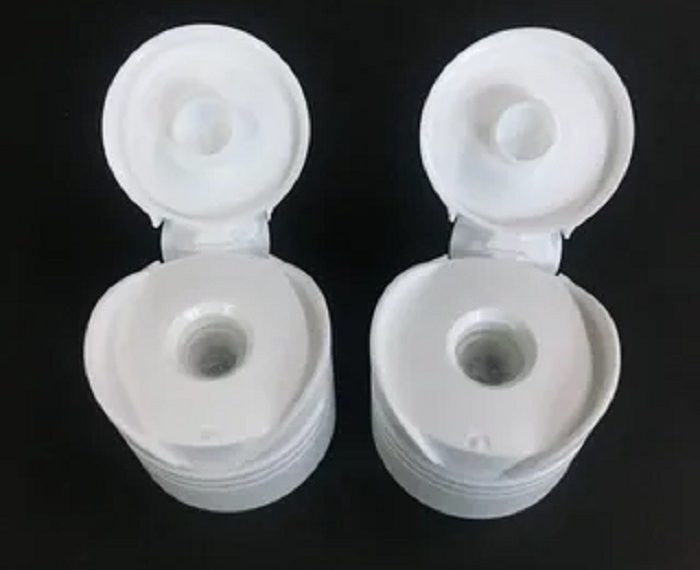 Flow-control flip-top squeeze tubes